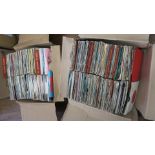 Ex record shop stock of pre-loved 7 inch vinyl singles in alphabetical order with golden oldies tabs