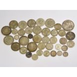 A bagged quantity of pre 20 silver coins to include an 1887 crown approx 60.7gms & pre 47 silver