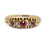 A ruby & diamond early 20th century ring, stamped 18ct, size O, approx 3.6gms