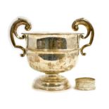 A silver two handled presentation bowl H/M Birmingham 1907 together with a single napkin ring,