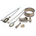 A bagged quantity of silver to include two Wedgwood pendants, napkin ring etc & a clog brooch from
