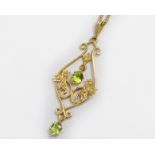 An Edwardian style 9ct H/M peridot & pearl set pendant & chain, approx gross weight 5.2gms