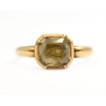 An 18th century memorial ring with initials set behind crystal, tested to high ct, size P, approx