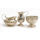 Two silver H/M Victorian & Edwardian jugs (1876 & 1910) together with a H/M 1876 Victorian bowl, one