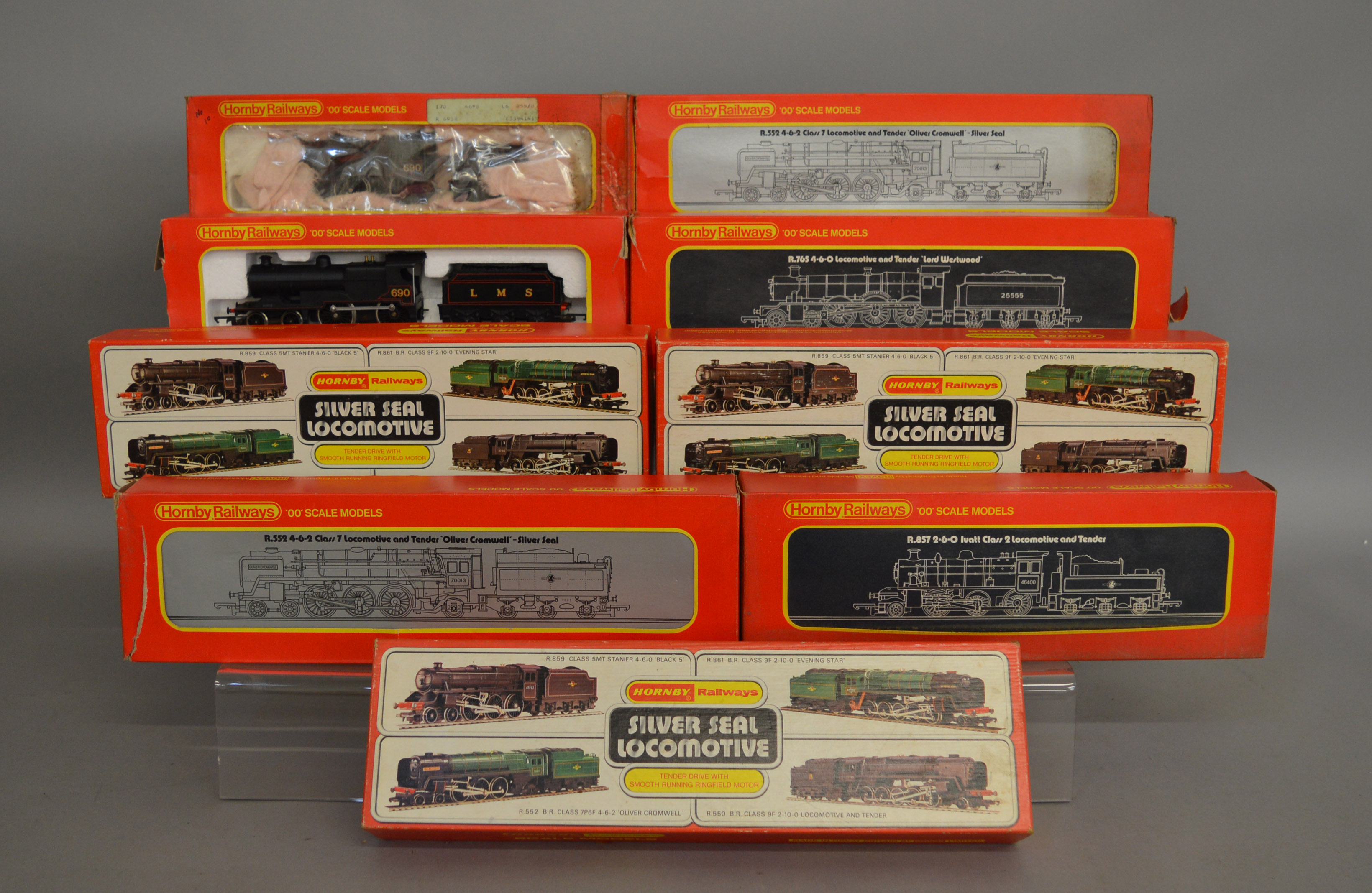 OO Gauge. 9 boxed Hornby Locomotives housed in incorrect, incomplete or poor packaging including R.