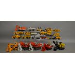 22 unboxed construction and agricultural related die-cast models by NZG, Conrad etc contained in 2