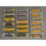 N Gauge. 10 boxed assorted items of Rolling STock by Model Power together with 10 box items by Atlas