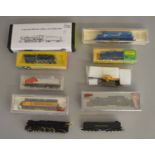 N Gauge. EX SHOP STOCK. Three boxed locomotives including two by Model Power a #7512 Alco Century