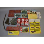 N Gauge. An assortment of American wooden building kits and accessories by Atlas, Campbell etc.