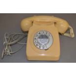 A 1970's GPO Type 746 Rotary Dial Telephone in cream, marked '746 GNA 73/1' to the underside,