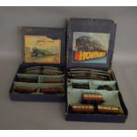 O Gauge. 2 boxed Hornby Train Sets including a Passenger Set containing an LMS 0-4-0 Locomotive  '