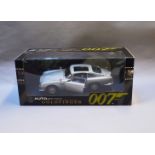 James Bond 007. A boxed Autoart 1:18 scale Aston Martin DB5 version with Gadjets and no Roof