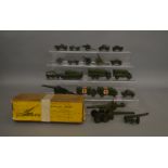 A boxed Britains #2064 155mm gun with some damage, together with 18 unboxed Military models which