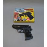 James Bond 007. A boxed Wicke 007 Pistol, a  plastic cap firing PPK  from 1983, appears E in E