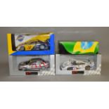 3 boxed UT Models diecast car models in 1:18 scale including an Opel Calibra V6, a Porsche 911 GTI