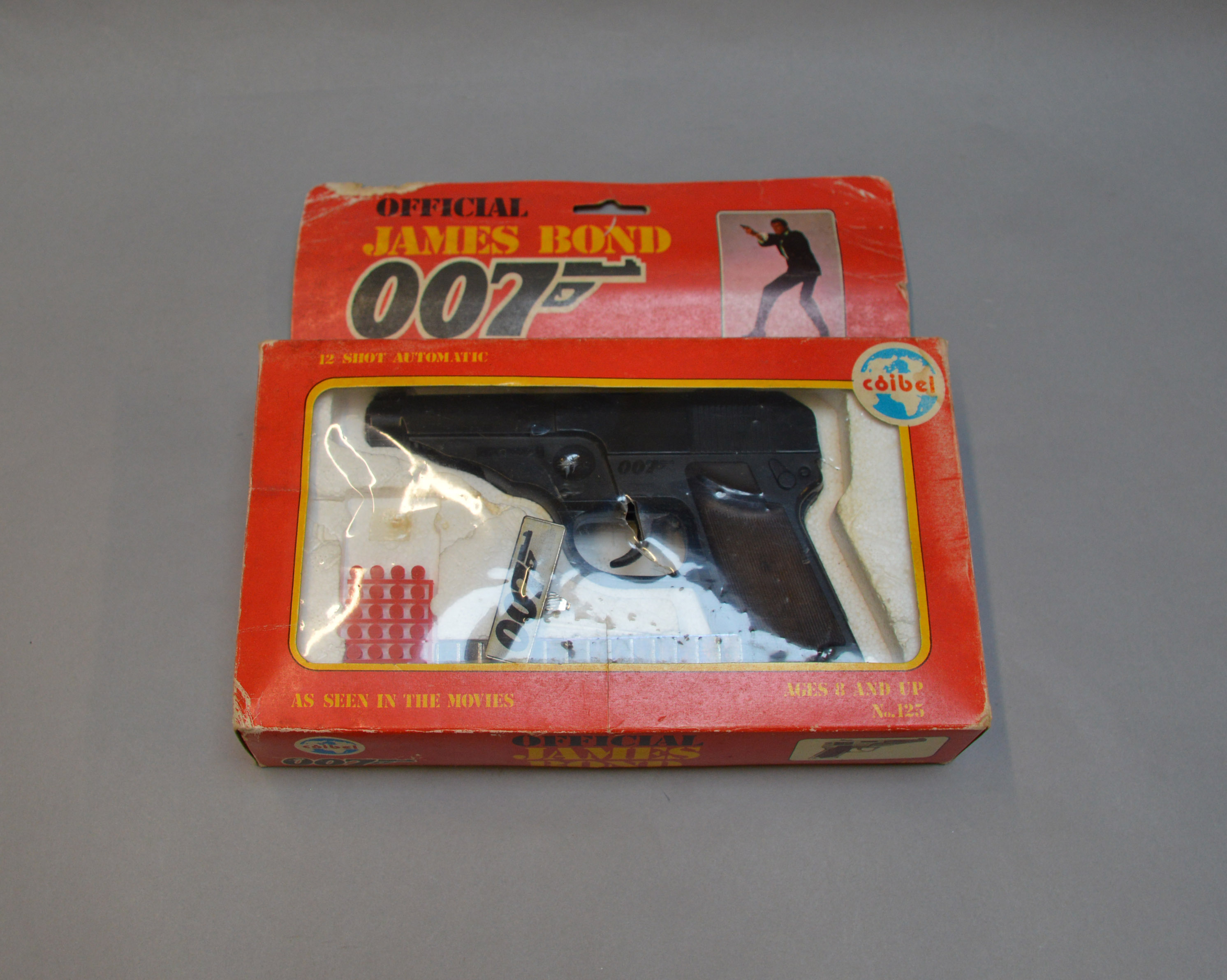 James Bond 007. A boxed Coibel James Bond Secret Agent 12 shot Automatic Cap Gun, from 1985, which