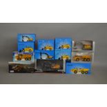 12 boxed Volvo construction related die-cast models by Scoop, Motorart etc (12).