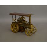 Live Steam. An unboxed brass Wilesco Traktor, traction engine model, which has been fired,  with