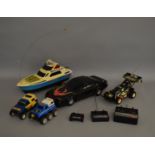 3 unboxed Nikko Radio Control Models including a Racing Car, a Toyota Hilux Off Road vehicle and a