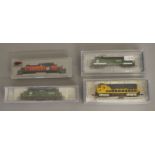 N Gauge. EX SHOP STOCK. 3 boxed Locomotives including two by Bachmann - #64053 U36-B Burlington