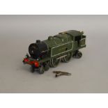 O Gauge. An unboxed Hornby 4-4-2 Locomotive 'Southern 329' in green, with key, overall appears G but