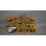 22 unboxed construction and agricultural related die-cast models by NZG, Joal, Siku etc contained in