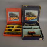 O Gauge. 2 boxed Hornby Train Sets including Goods Set No.30 containing a BR green 0-4-0