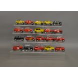 20 unboxed Scalextric Mini models including 4 x C122 in red and two in yellow, three C7 cars in