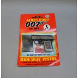 James Bond 007. A carded Coibel James Bond Secret Agent 'Hideaway Pistol', from 1985. The card