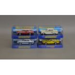 3 boxed Scakextric Ford Escort models including C2966 RS1600 Yellow, C3113 Mk1 Mexico Red and
