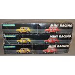 3 boxed Scalextric C1019 'Mini Racing' sets, one being a 40th Anniversary edition set exclusive to