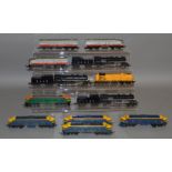 OO Gauge. A good selection of unboxed Tri-ang Continental Locomotives including an R.155 Diesel