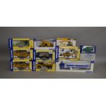 11 die-cast Komatsu boxed models, which includes; Dump Truck, Bulldozer, Backhoe Loader etc (11).