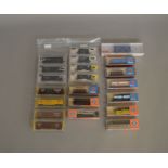 N Gauge. EX SHOP STOCK. 21 boxed items of Rolling Stock, mostly  by Roco and Atlas Hopper and Ore