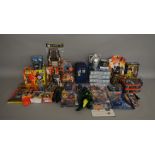A Star Wars mixed lot which includes; loose figures, Magazine issue figures, money box, FunFax,