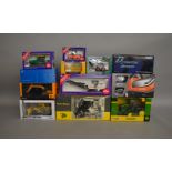 12 boxed construction and agricultural related die-cast models by; MotorArt, Conrad, Britains,