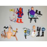 Captain Action outfits and accessories on torsos by Ideal including Spiderman, Phantom, Buck