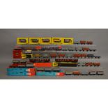 OO Gauge. 13 boxed Trix items of Rolling Stock including six Wagons and 7 maroon BR Coaches of