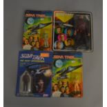 4 Star Trek action figures by Mego and Galoob, 3 figures are still fully sealed on their cards (4).
