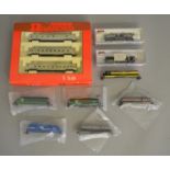 N Gauge. EX SHOP STOCK. A boxed Arnold (Rivarossi) Penn Central 3 coach set together with two