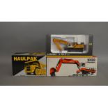 3 construction related die-cast boxed models by Dresser, Liebherr and Poclain (3).
