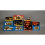 11 construction related boxed die-cast models by ERTL, which includes; John Deere, Mighty Movers etc