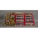 OO Gauge. 12 boxed Dapol Wagons of various types together with seven boxed Dapol Coaches, mostly