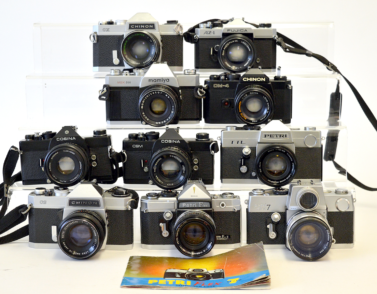 Group of Ten 35mm SLRs with Lenses.