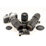 Nikkormat FT2 Camera & 3 Nikkor Lenses.