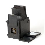 An Adams Minex De Luxe 5x4 Plate Camera.