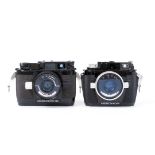 Two Nikonos Underwater Film Cameras.