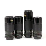 Four Canon FD Zoom Telephoto Lenses.