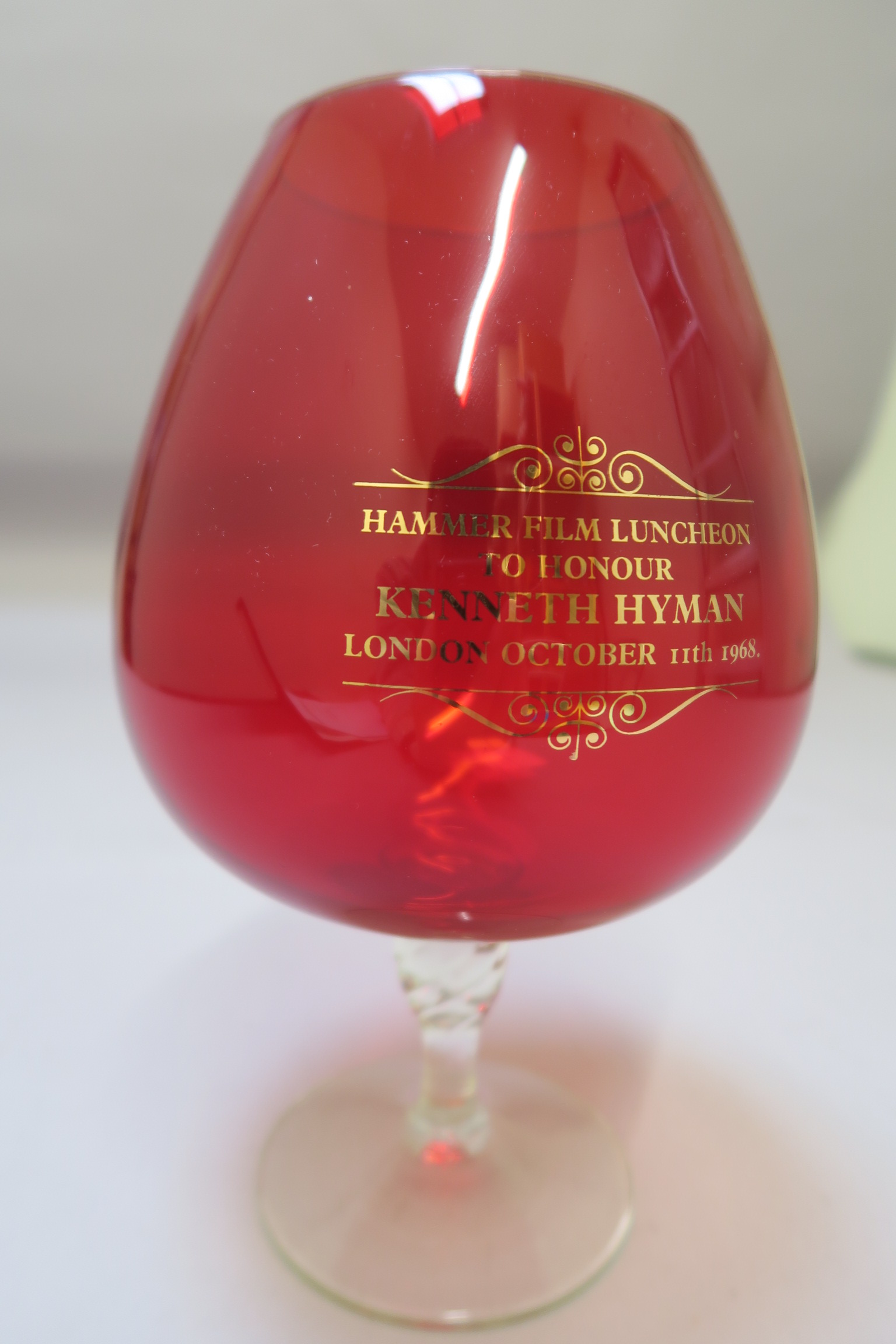 "Hammer Film Luncheon to honour Kenneth Hyman London October 11th 1968" Red glass vase with