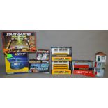 A mixed lot of vintage Scalextric accessories including boxed examples.